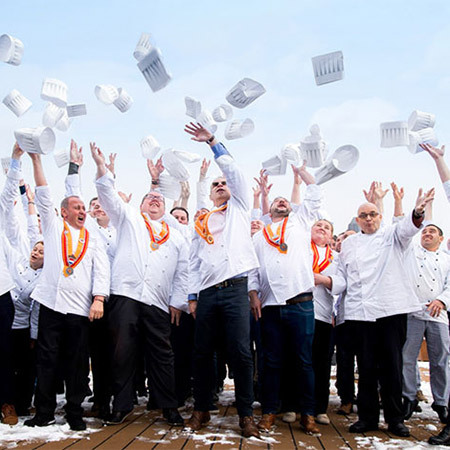 Chefs tossing their hats