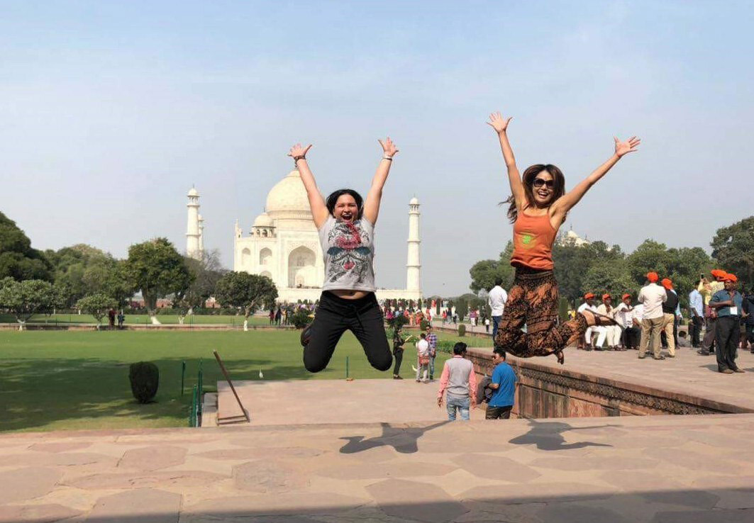 Jumping in front of the Taj Mahal